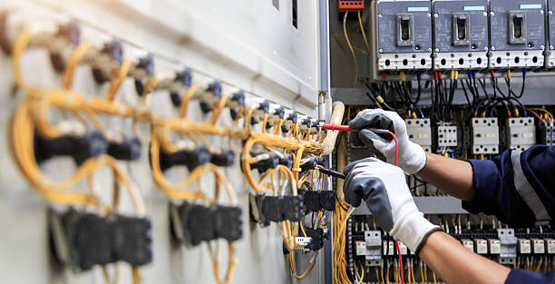 Professional Electrician technician working in Key Center, WA